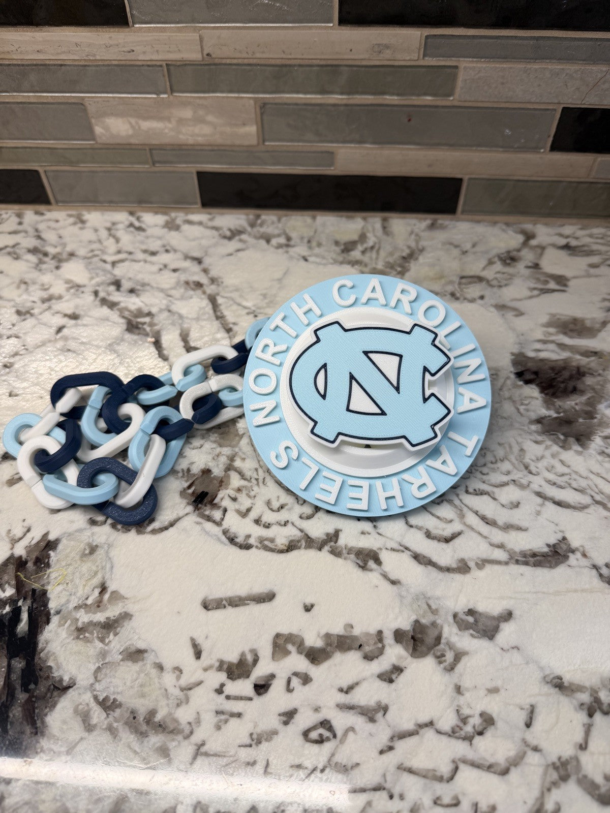 North Carolina Tarheels Spinner Turnover Chain | 4.75” Pendant | 36” Chain | UNC