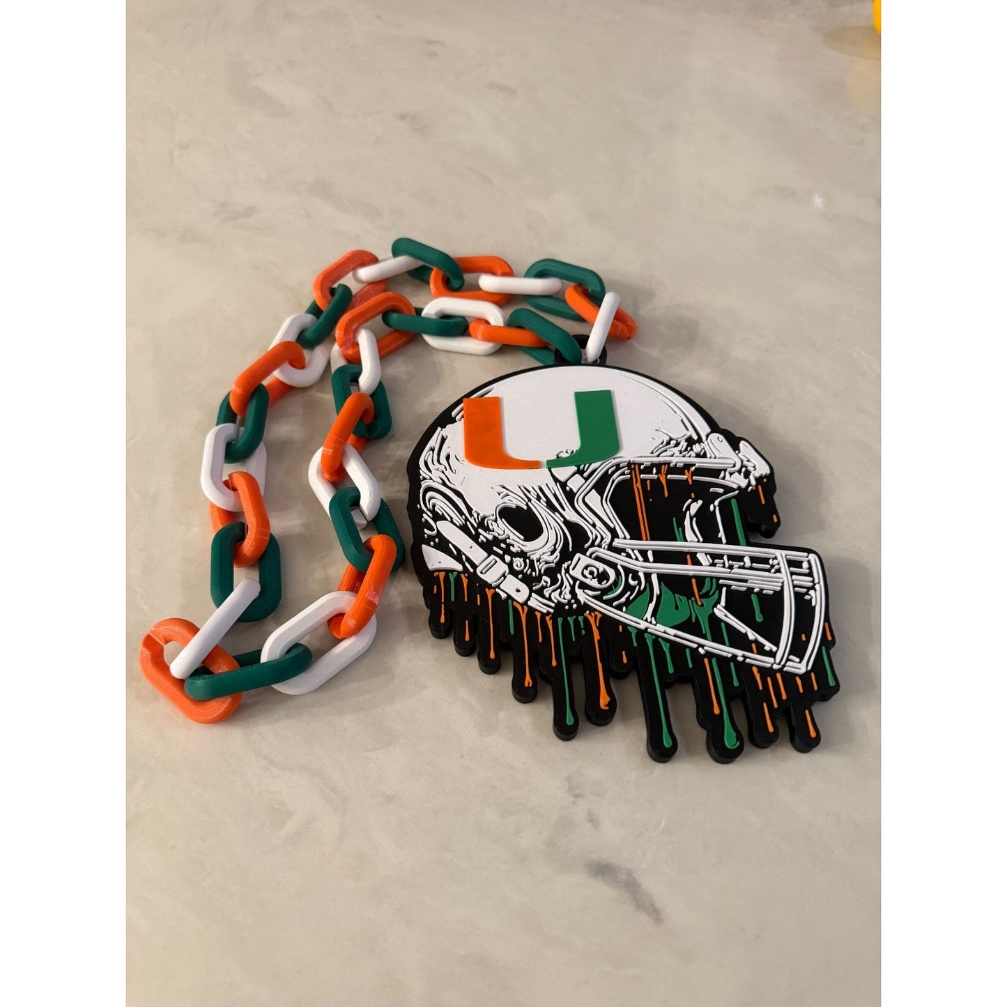 Miami Hurricanes Helmet Drip Hype Chain Fan Necklace "The Canes"